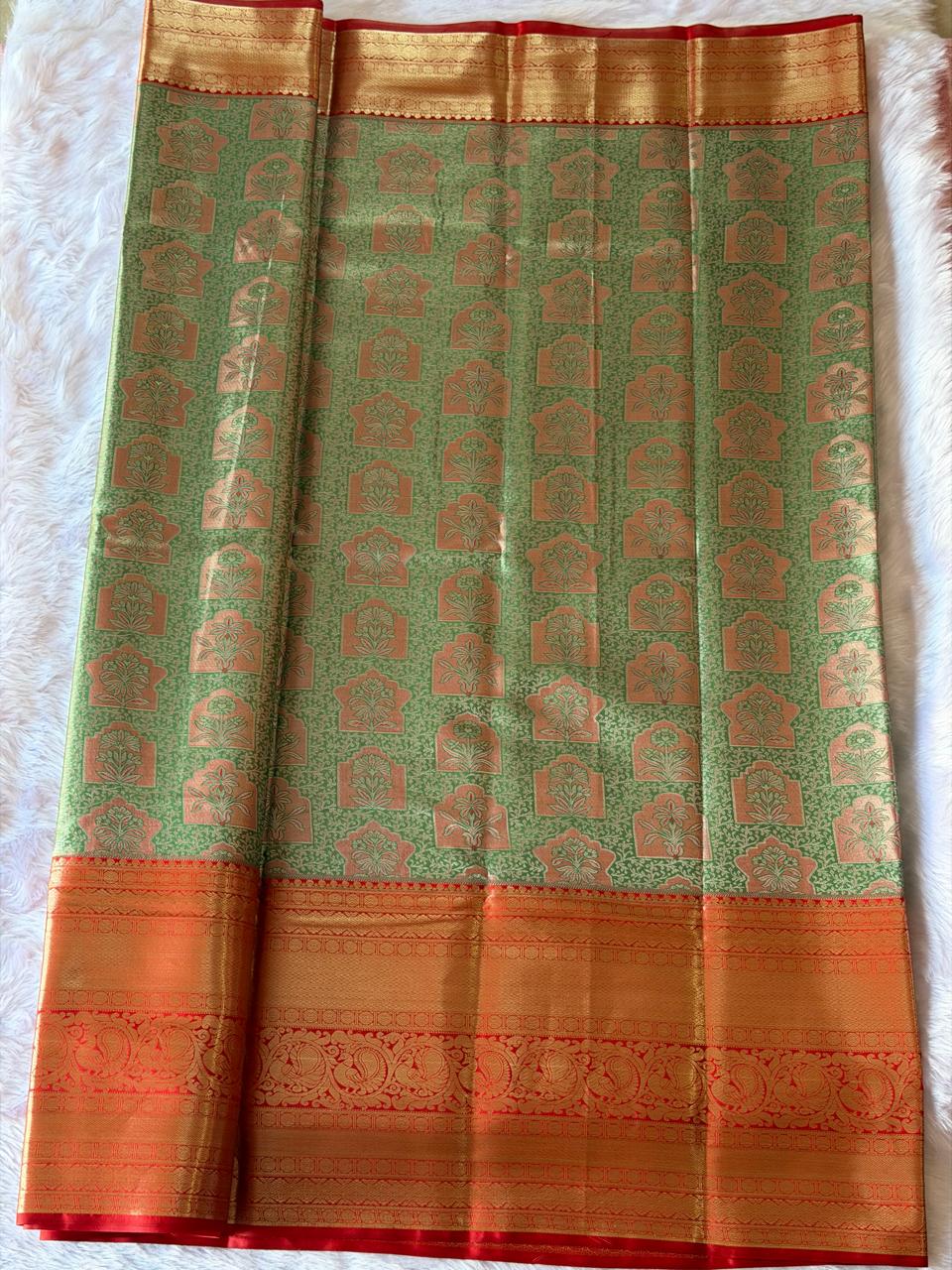 Green and gold floral brocade Kanchipuram polyester saree body with rich texture