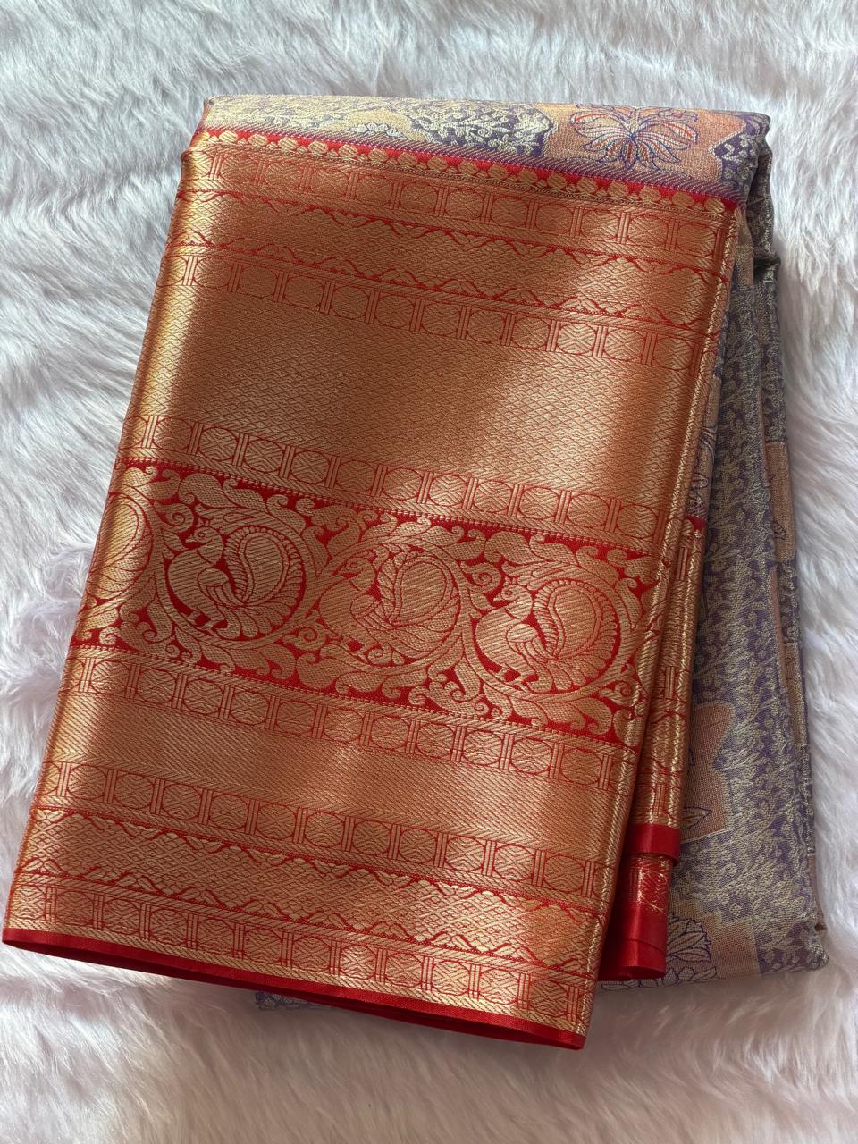 Gold zari contrast border with floral temple motifs on lilac Kanchipuram polyester saree