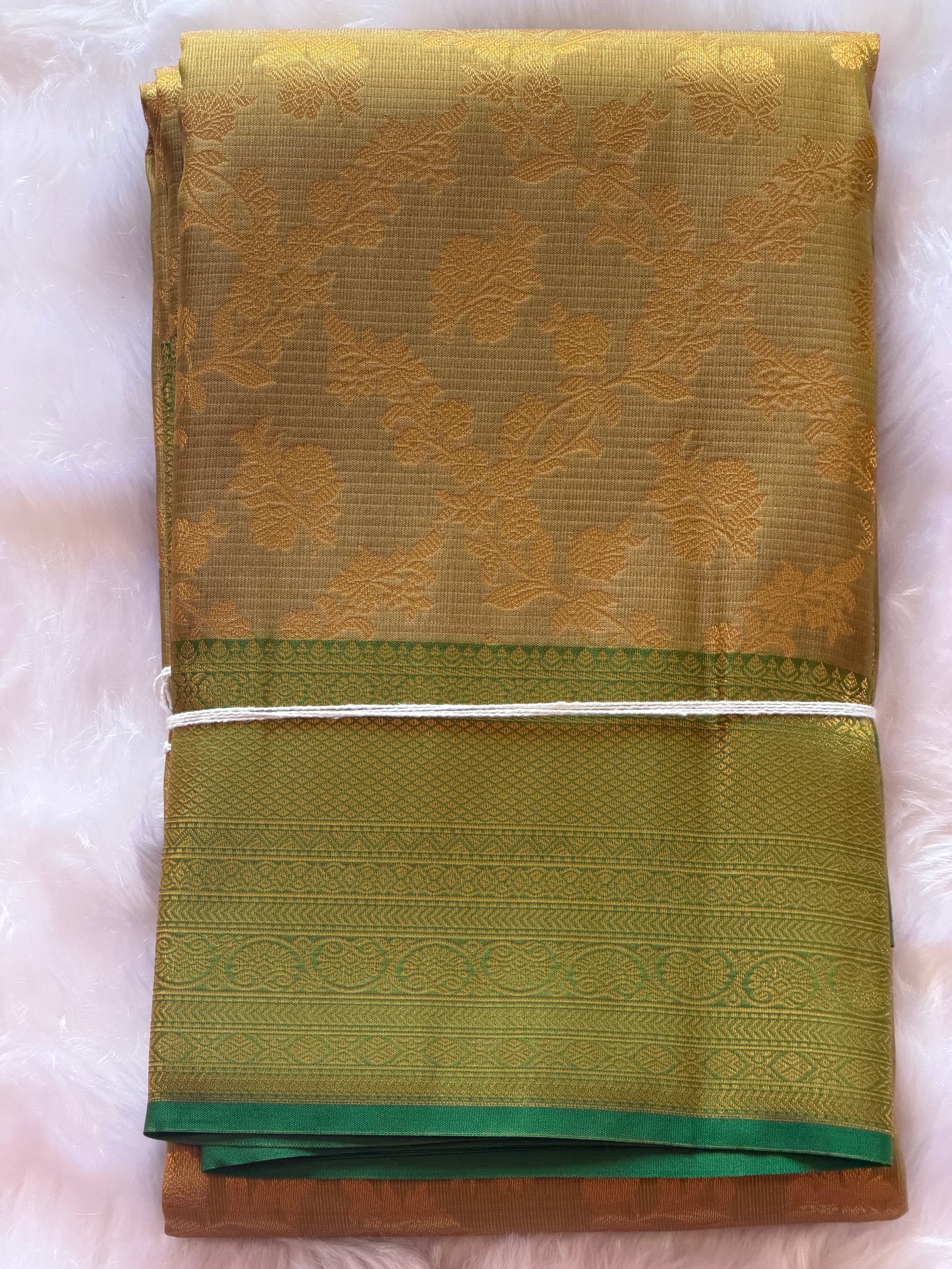 Olive gold Kanchipuram polyester saree draped view - earthy nature-inspired South Indian saree
