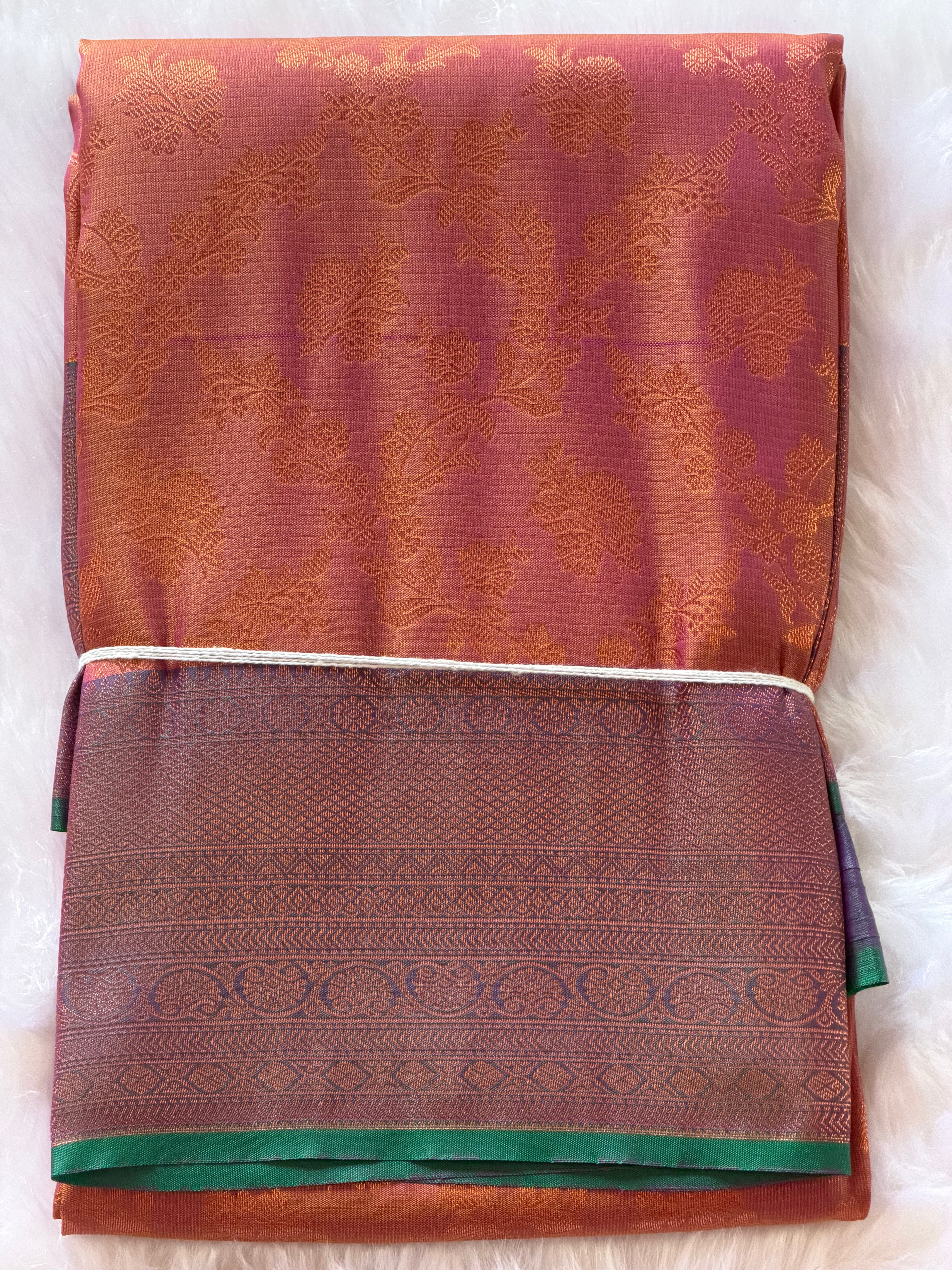 Russet orange Kanchipuram polyester saree draped view - warm tones for Diwali and weddings