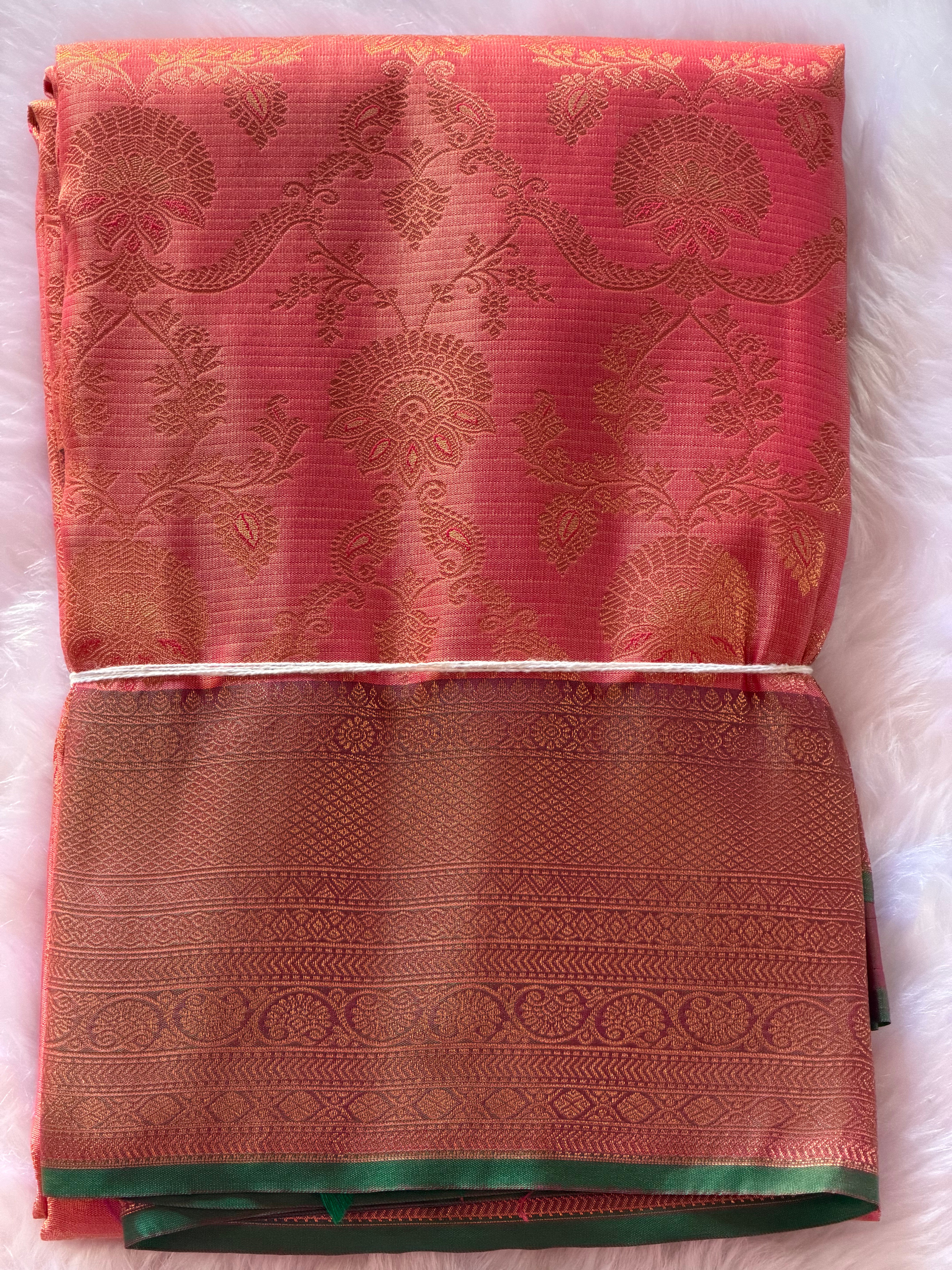 Soft peach Kanchipuram polyester saree draped view - feminine and elegant for Navarathri