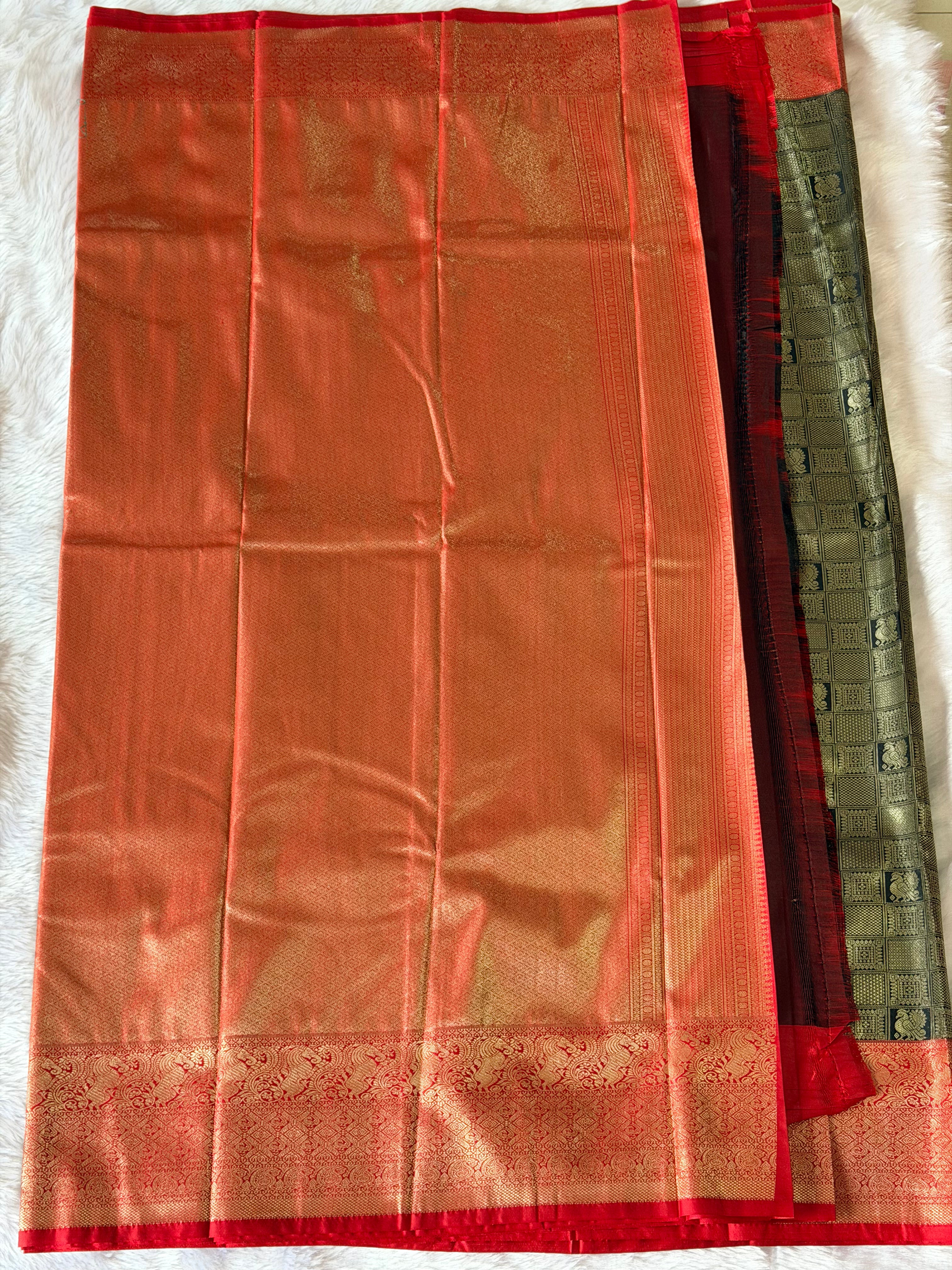 Charcoal Kanchipuram polyester saree body with dense geometric grid and gold peacock motifs