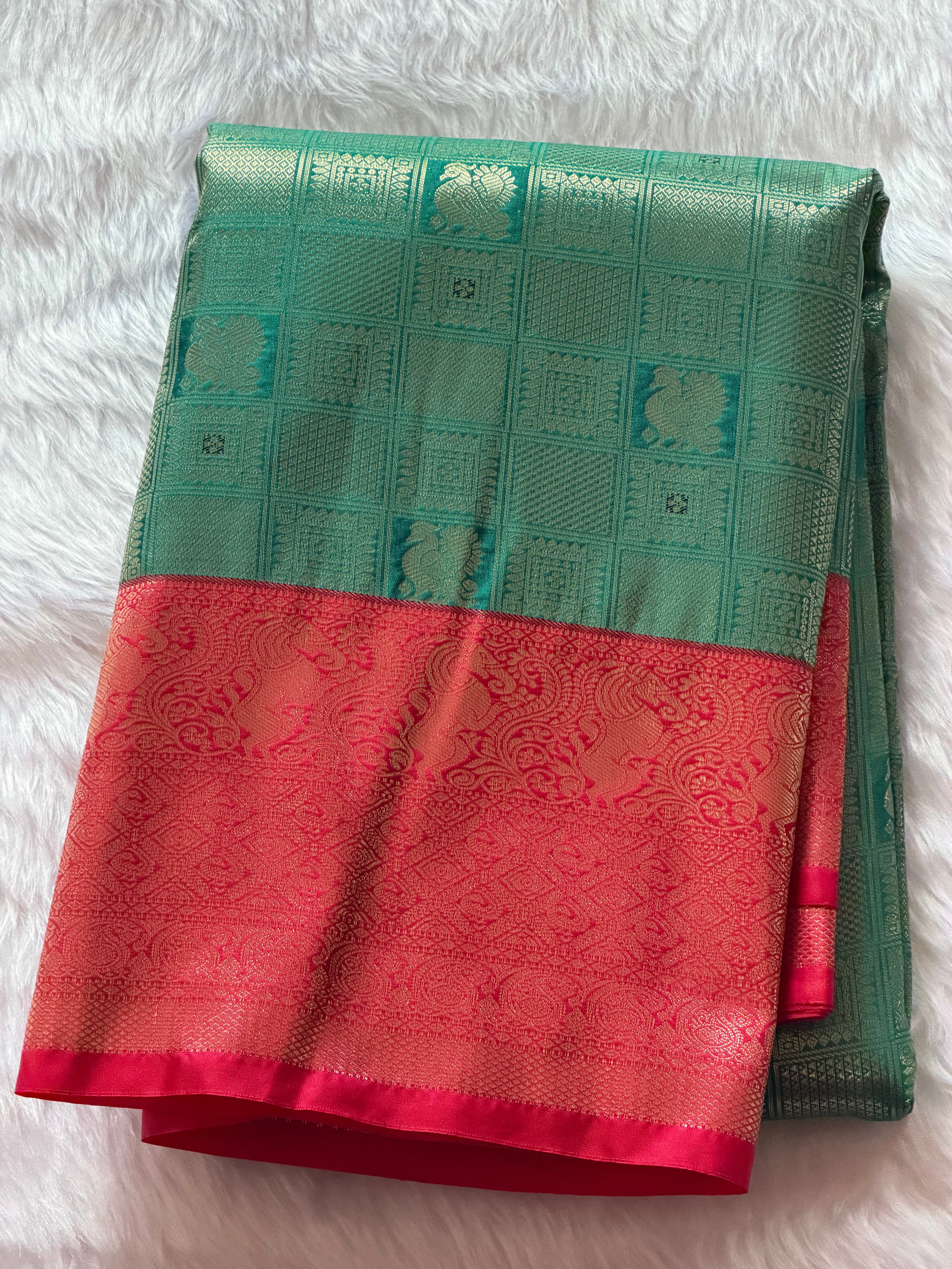 Emerald green Kanchipuram polyester saree draped view - vibrant green kattam design for Navarathri