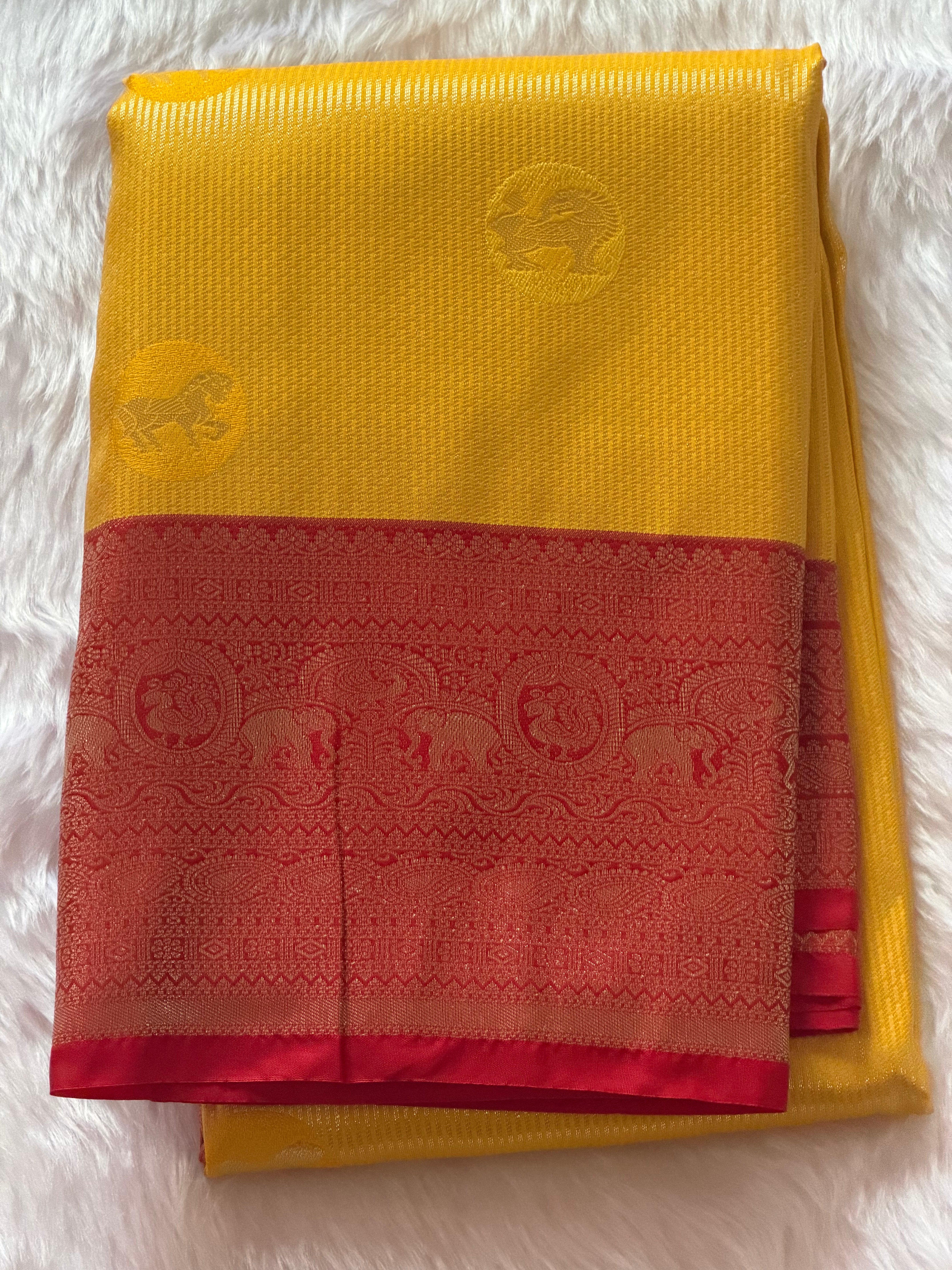 Mustard yellow Kanchipuram polyester saree draped view - radiant colour for Pongal and weddings