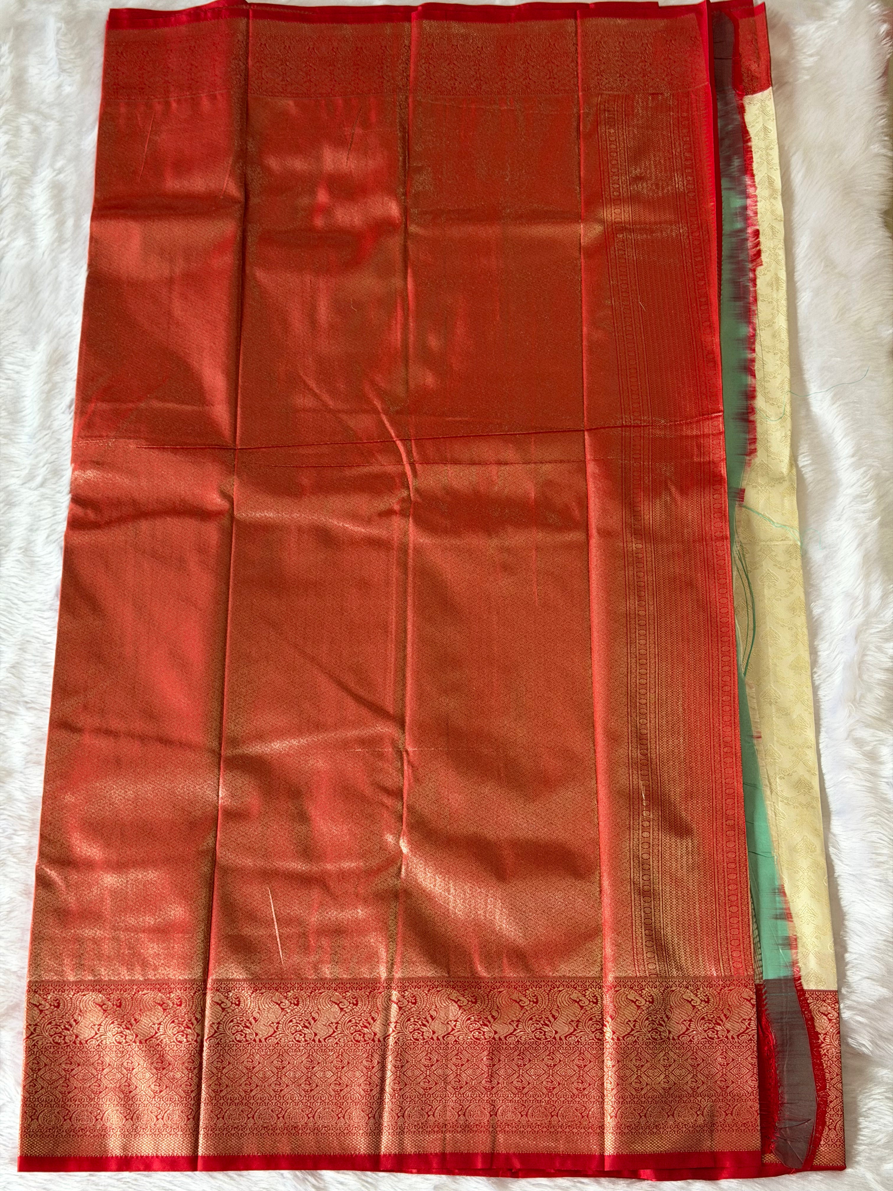 Off-white Kanchipuram polyester saree body with subtle tonal woven patterns