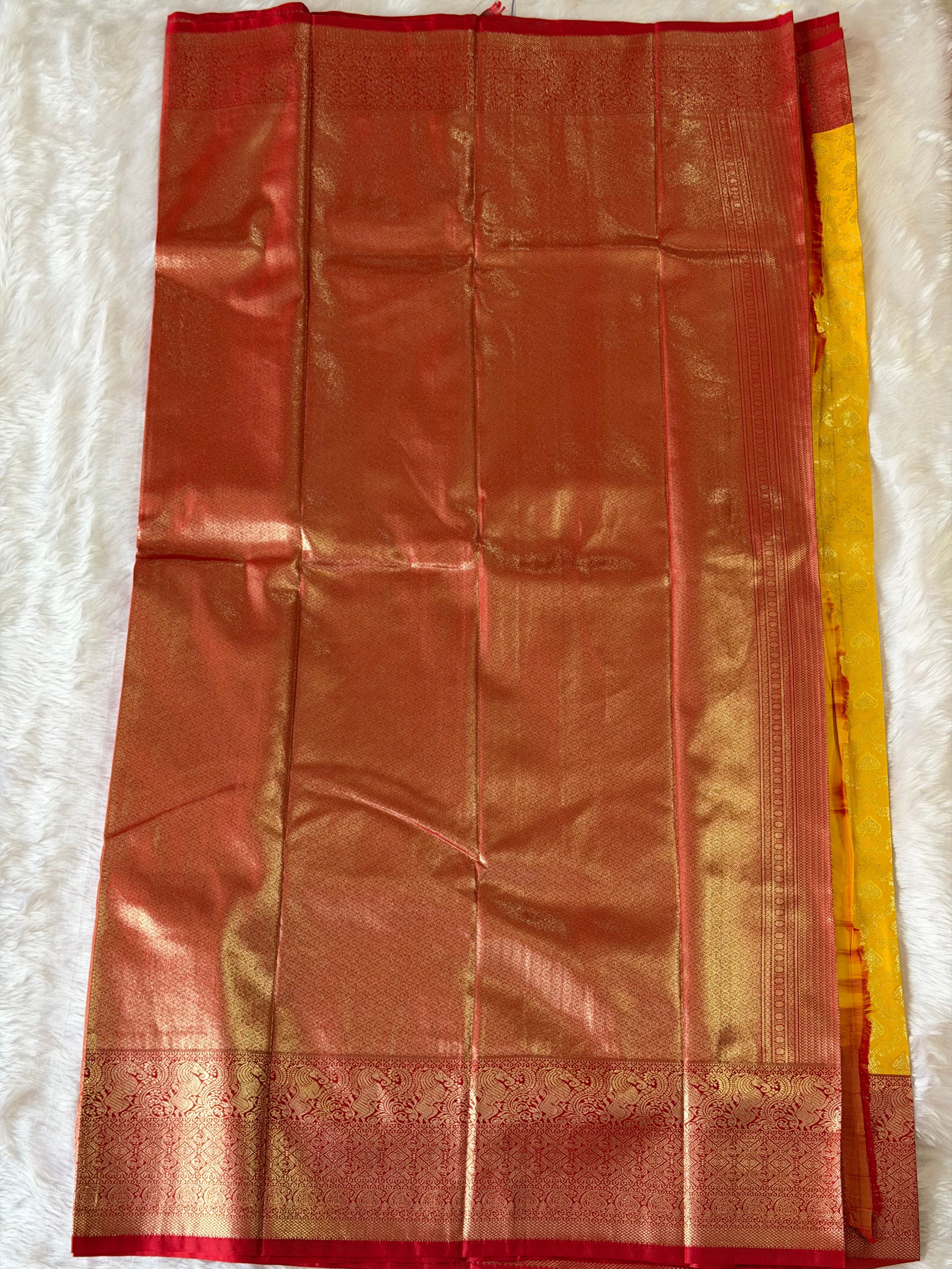 Mustard yellow Kanchipuram polyester saree body with self-jacquard leaf motifs