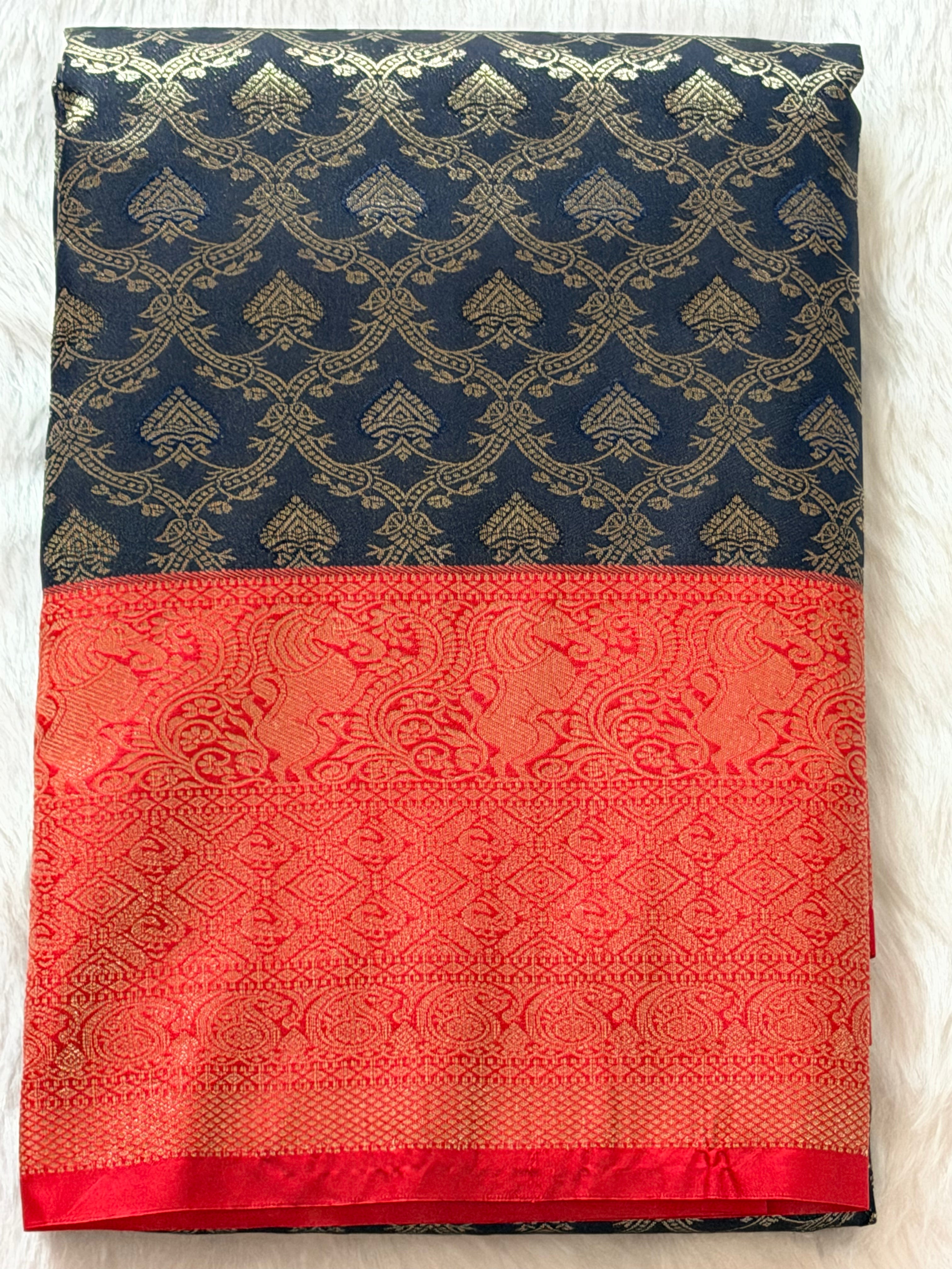Regal black Kanchipuram polyester saree with red and gold floral zari border - glamorous drape
