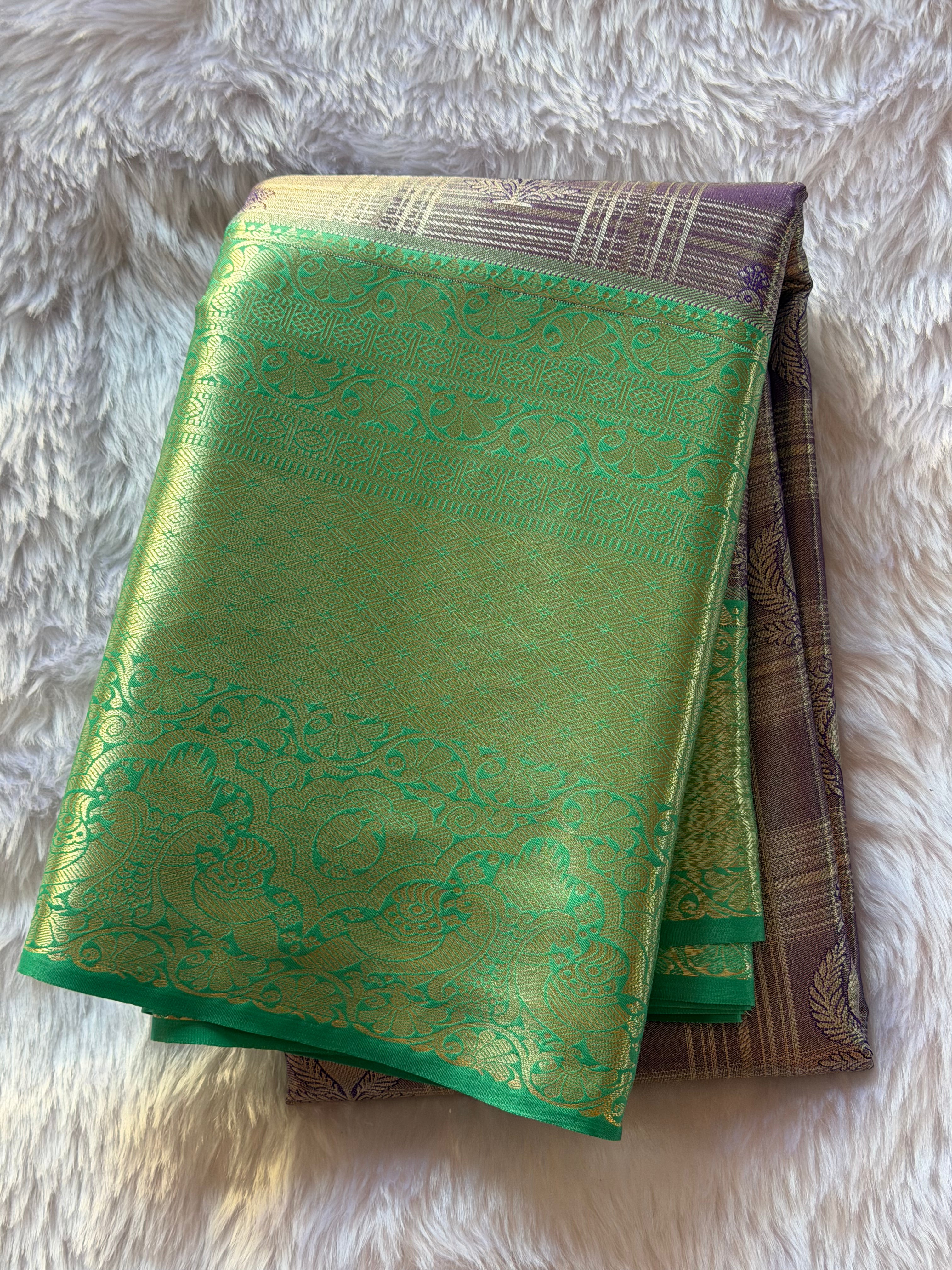 Emerald green Kanchipuram polyester silk saree with royal purple contrast border and pallu - NN Silk Sarees