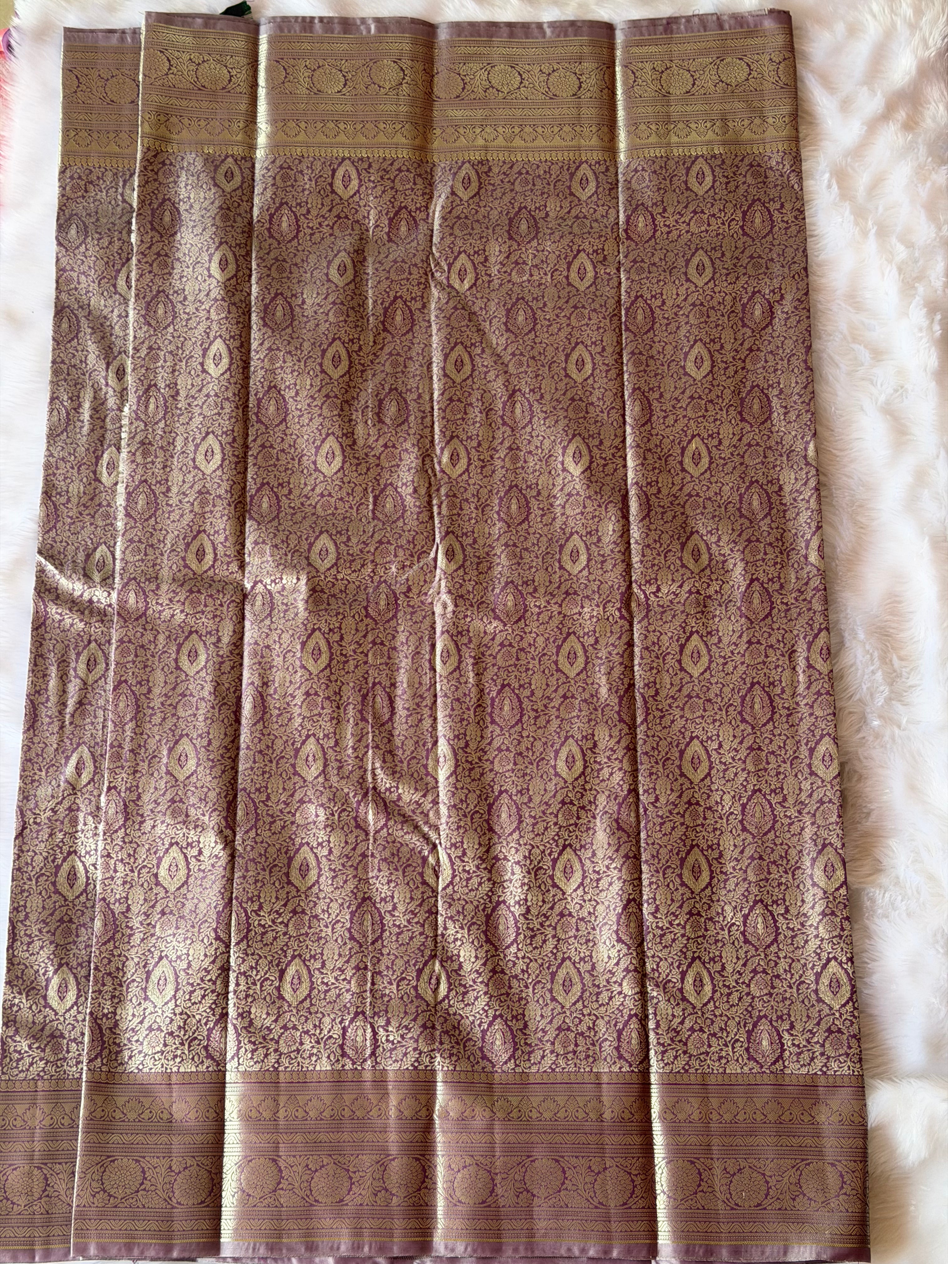 Kanchipuram polyester saree draped view - vibrant colours and fine zari detailing for Pongal and Diwali