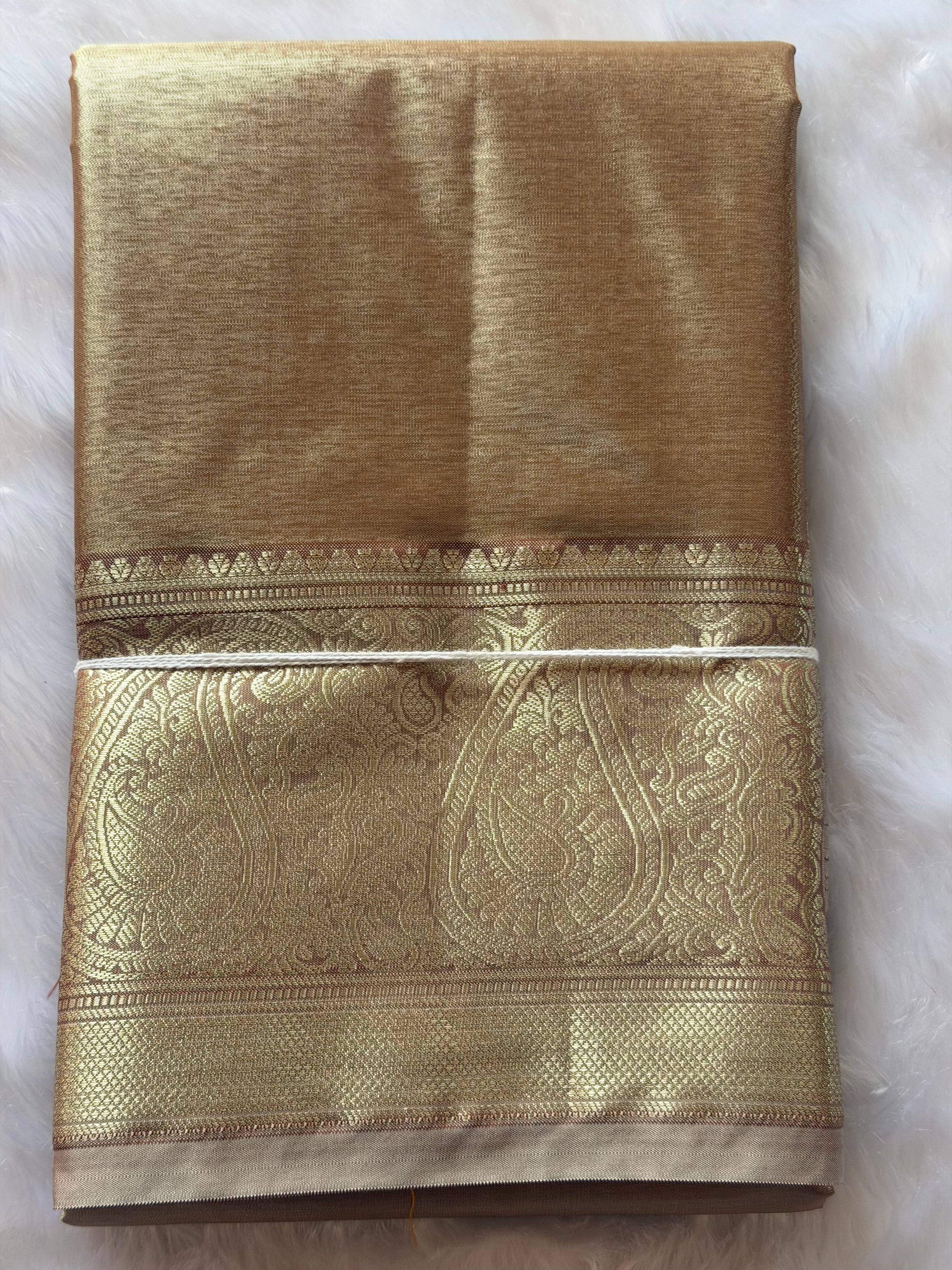 Kanchipuram tissue silk saree draped view - radiant golden shimmer for bridal and South Indian festivals