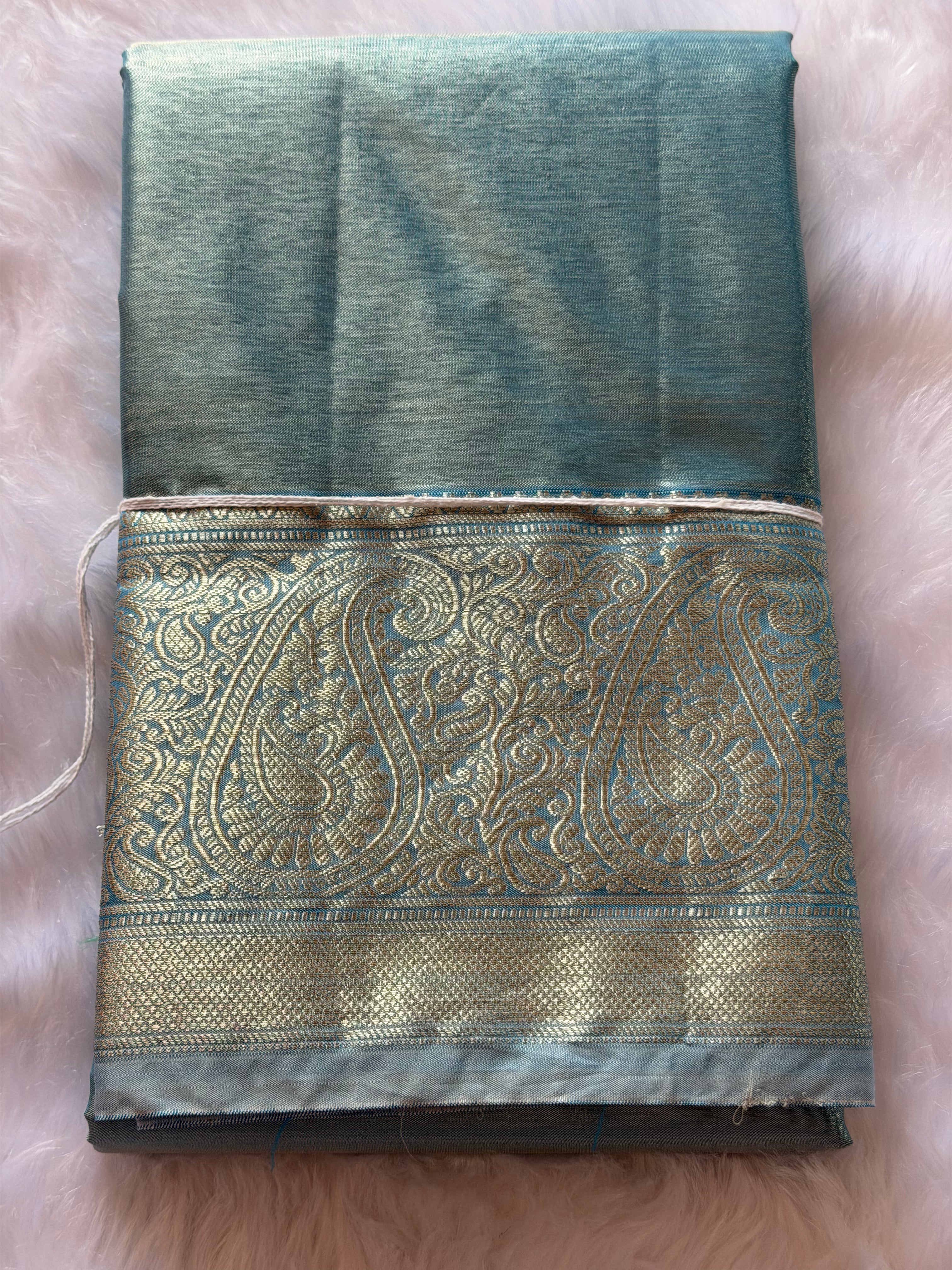 Kanchipuram tissue silk saree draped view - lightweight elegant for grand celebrations and weddings