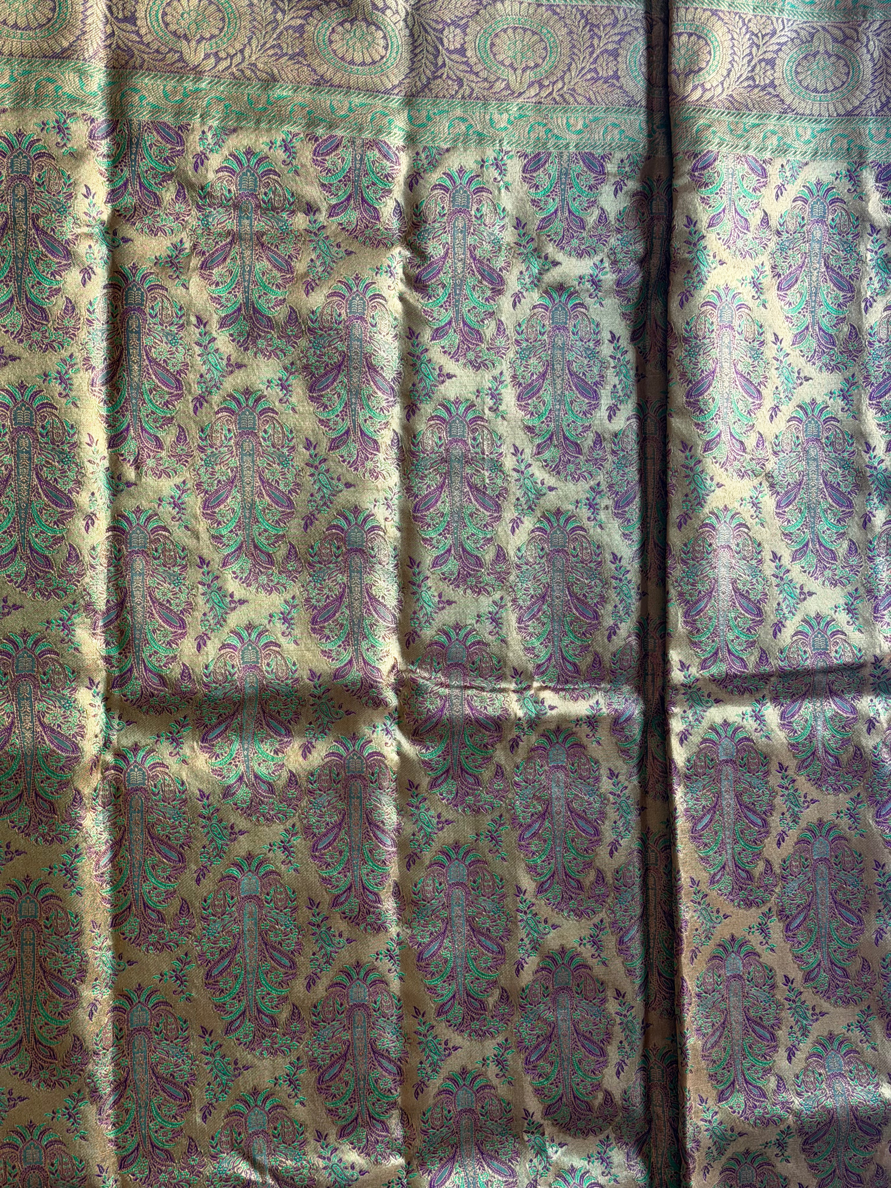 Kanchipuram pure silk saree pallu detail - elegant zari weaving by master weavers
